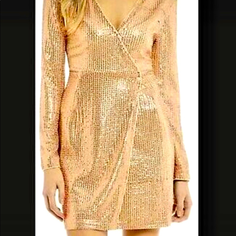 Brand new GB gold sequin wrap dress. Never been worn with tags. Size L.